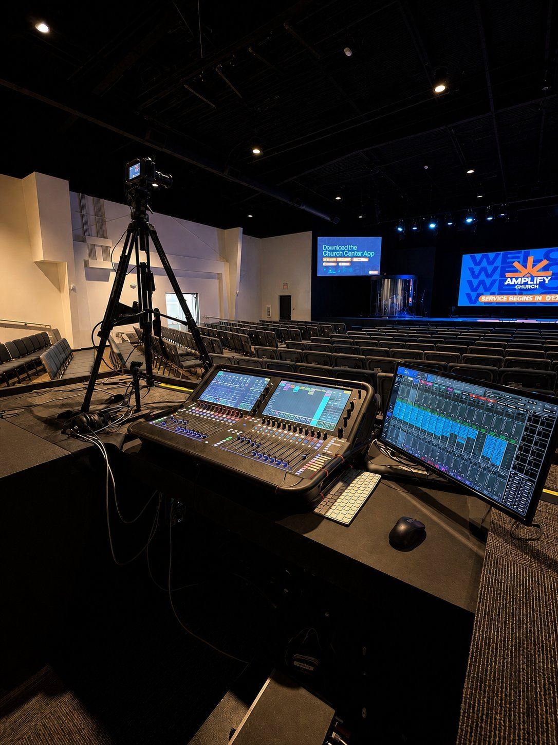 Church stage with professional lighting installation by Equip AVL